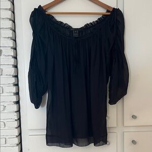 Marc Jacob’s. Navy 100% Silk top. Adjustable neck line and sleeves. Size Small.